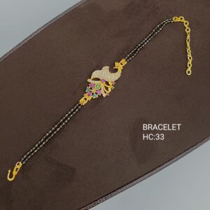 Gold Plated Adjustable Black Beaded Bracelet With Vintage Bird Floral Pendant