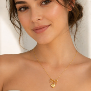 Elegant Gold Bow Heart Pendant Necklace.